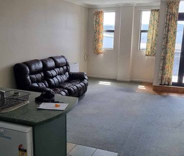 Spacious 4BR Newtown Gem w/ Balcony! - Photo 1