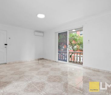 WELL-MAINTAINED BLOCK & APARTMENT - Photo 5