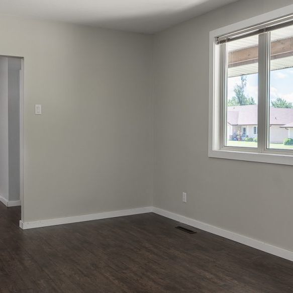 Stunning 3 Bedroom Home with Full Basement - Photo 1