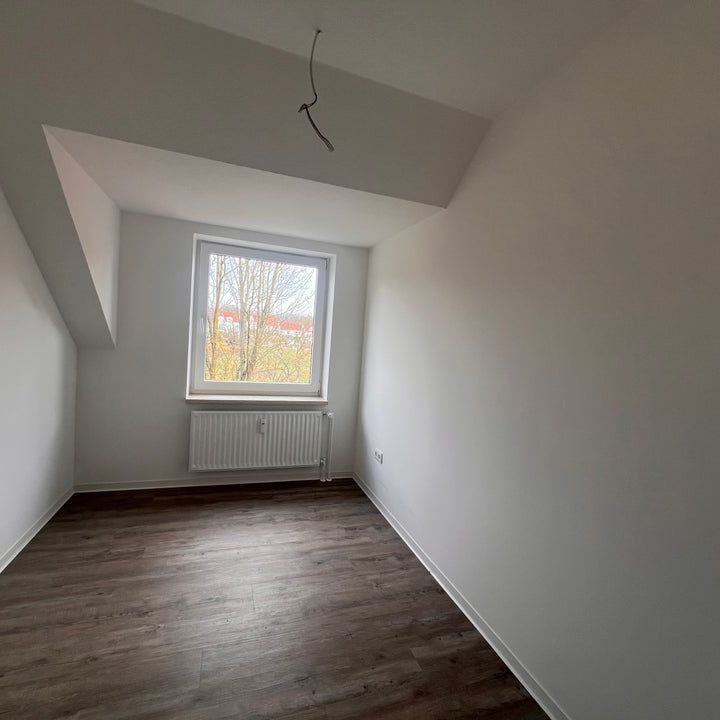 Helle 3-Zimmer-Dachgeschoss-Wohnung mit Weitblick! - Photo 1
