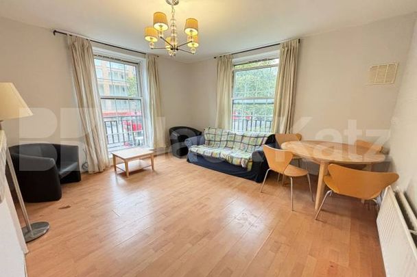 Bright & airy, freshly repainted throughout Mid-Century apartment. - Photo 1