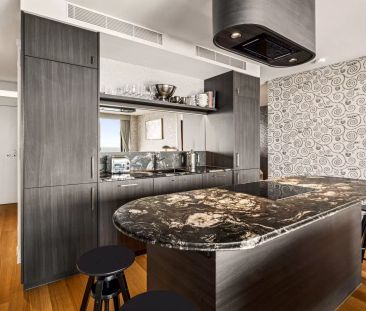 Sub-Penthouse Elegance with Stunning Ocean Views - Photo 6