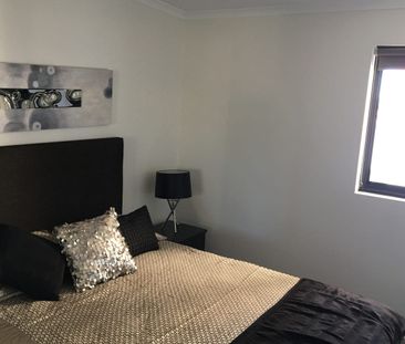 LOW MAINTENANCE 2 BEDROOM, 2 BATHROOM FURNISHED APARTMENT IN THE CI... - Photo 3