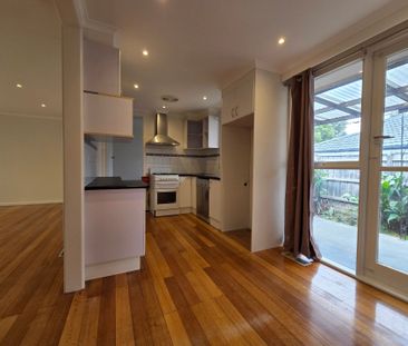 Freshly Painted, Perfectly Positioned Three Bedroom! - Photo 3