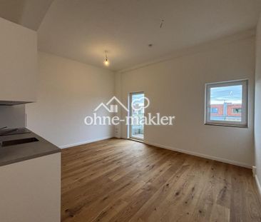 Moderne Neubau-Dachgeschosswohnung in unmittelbarer Nähe zur Schloß... - Foto 1