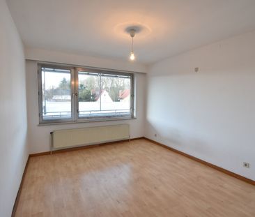 Appartement met 2 slaapkamers en garage vlakbij station! - Photo 1