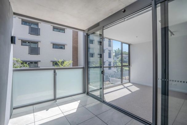 Experience Modern Living at the Prestigious "Seventy One" Complex - Photo 1