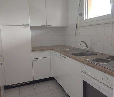 Breganzona, grazioso 2.5 locali al 4. e ultimo piano - Photo 1
