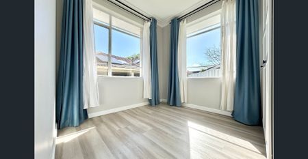 Beautifully presented family home set in prime location, offering both comfort and convenience - Photo 3