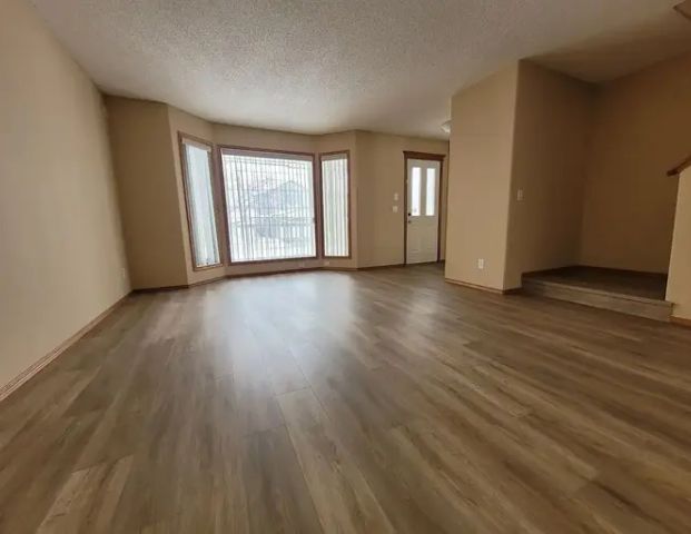 Cozy 4 Bedroom Single House in Evanston with Walkout Basement | Calgary - Photo 1