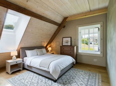 Charming 3.5-room penthouse apartment in a central location in Bätterkinden - Photo 2