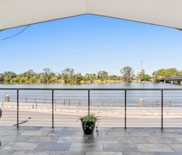 Riverside Living with Lift Access & Stunning Water Views – Fully Ap... - Photo 5