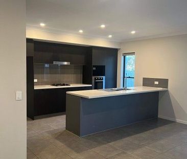 Beautiful 4-Bedroom Family Home in the Heart of Coomera - Photo 3