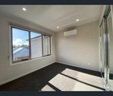 Sleek Modern Near New Two Bedroom Townhouse - Photo 2