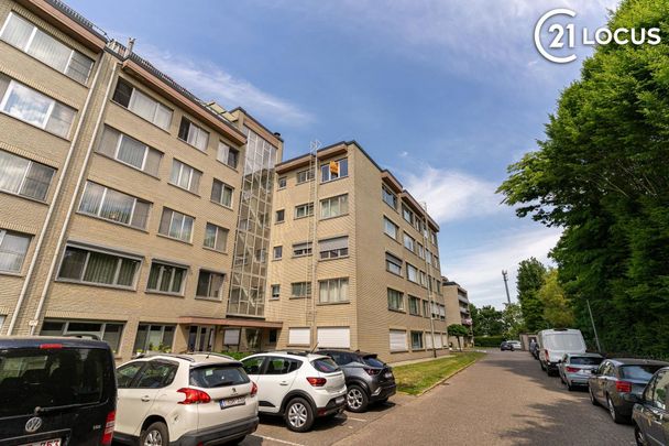 Centraal gelegen 2-slpk app met parking en warmtepomp - Photo 1