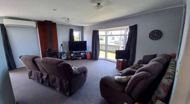 Fully Fenced Family Home! - Photo 1