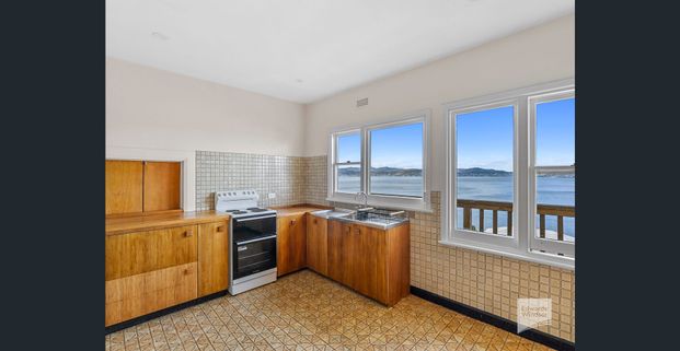 Spacious 4 Bedroom Home in Coveted Sandy Bay Location - Photo 1