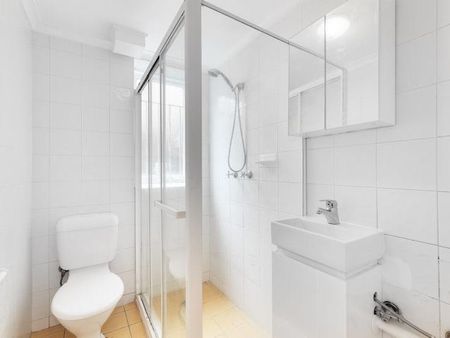 Well-Proportioned Two-Bedroom Apartment with Natural Light Throughout! - Photo 4