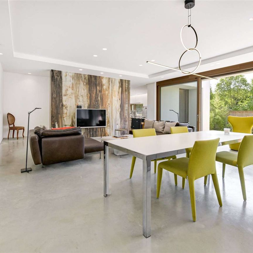 A fantastic, contemporary four bedroom home located on the prestigious West Hill Road. - Photo 1