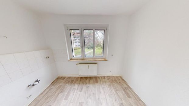 In ruhiger Seitenstraße gelegene 2-Raum-Wohnung mit Balkon - Photo 1