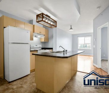 Spacious 1-Bedroom Condo | All Utilities Included | Heated Undergro... - Photo 1