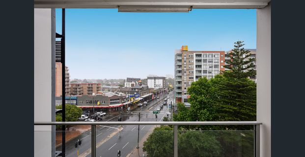 Conveniently Located Two Bedroom Apartment with Secure Parking - Photo 1