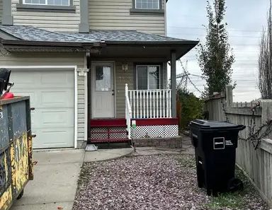 Cozy 3-Bed Duplex w/ Greenhouse, Garage, 2 Living Areas, & Finished Basement! | 7904 2 Avenue Southwest, Edmonton - Photo 1