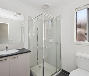 Spacious Family Home with Study & Multiple Living Areas - Photo 6