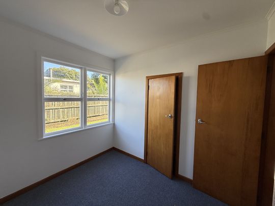 Cozy two bedroom rear unit - Photo 1