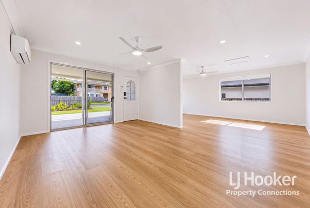 Stylishly Refreshed Family Home in the Heart of Albany Creek! - Photo 1