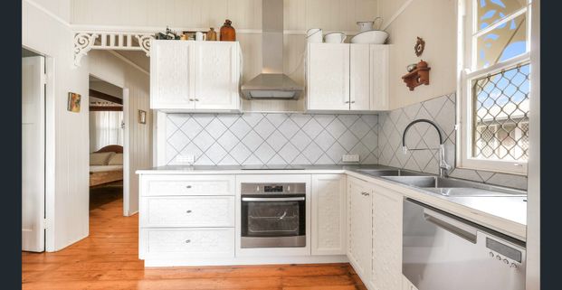 Charming Character Cottage in Prime Rangeville Location - Photo 1