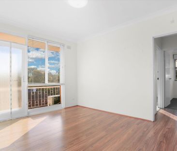 RENOVATED TOP FLOOR UNIT WITH AIRCON - Photo 2