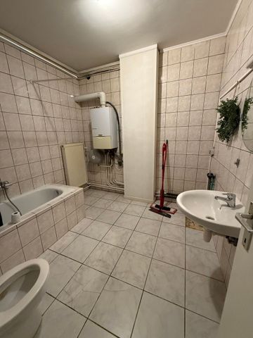 Appartement met 2 slaapkamers in de bruisende handelsstraat Vennestraat te huur! - Photo 4