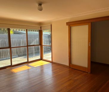 THREE BEDROOM HOME WITH LARGE YARD AND GARAGE - Photo 1