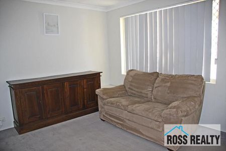 WELL-PRESENTED 3X1 HOME IN ULTRA-CONVENIENT LOCATION - Photo 2