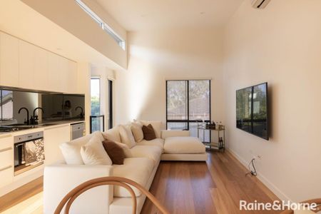 Architectural Townhouse In Brunswick Awaits - Photo 2