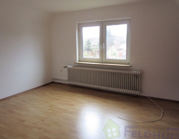 Oberwohnung mit ausreichend Platz in Moormerland-Warsingsfehn! - Photo 1