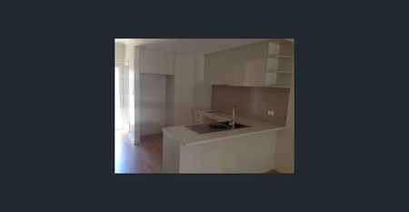 MODERN TOWNHOUSE IN SOUGHT AFTER LOCATION - Photo 5