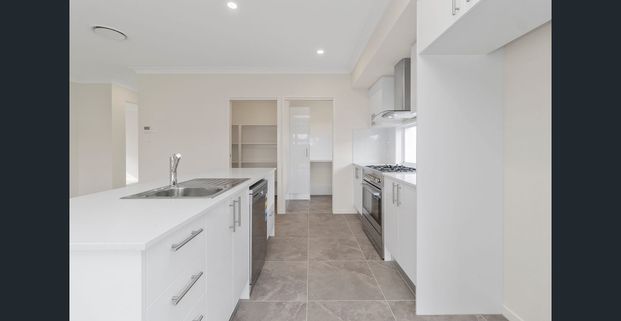 Brand New Home with Ducted AC & Media Room - Photo 1