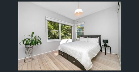 Stylish Two-Bedroom Apartment with Stunning Water Views - Photo 3