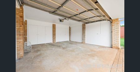 Elevated Family Home with Water Glimpses & Room to Move! - Photo 3