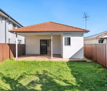 4-Bedroom Family Home with Modern Comforts and Expansive Outdoor Sp... - Photo 3