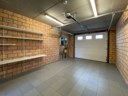 Ruime woning met 4 slaapkamers, garage en tuin. - Foto 4