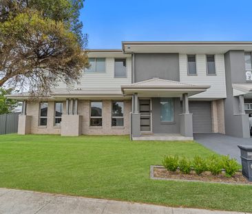 Beautifully presented three-bedroom home - Photo 6