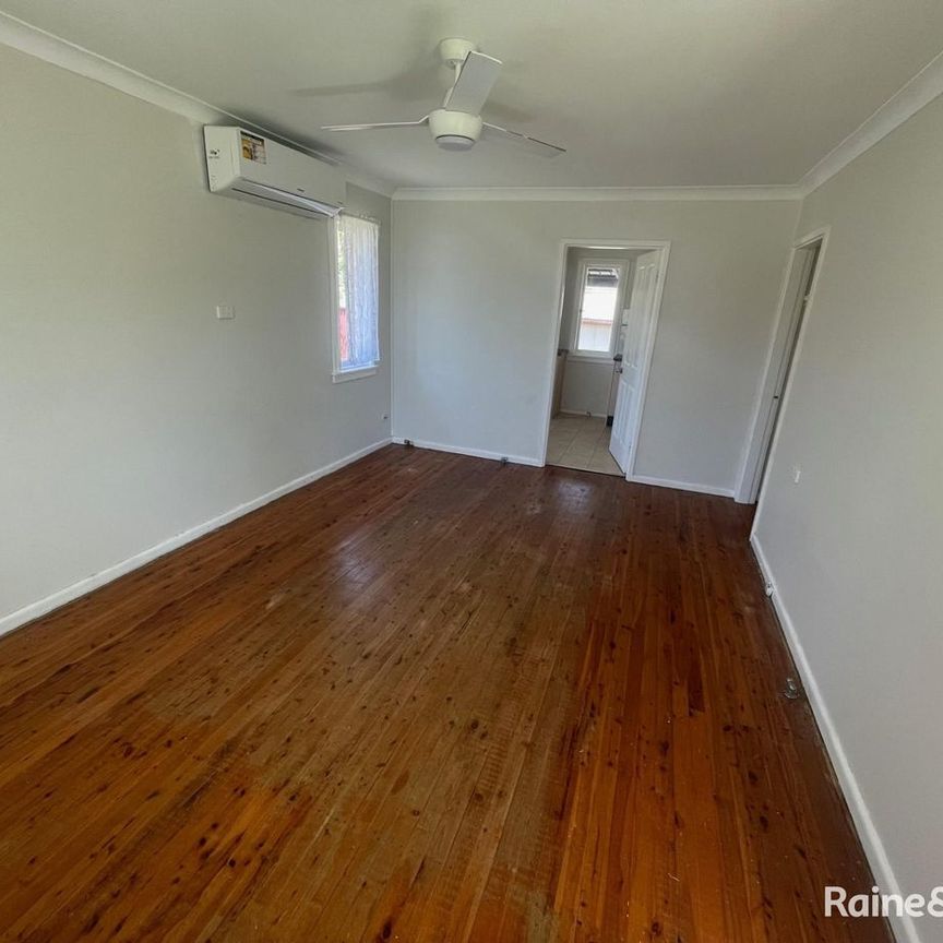 Three Bedroom Family Home - Photo 1