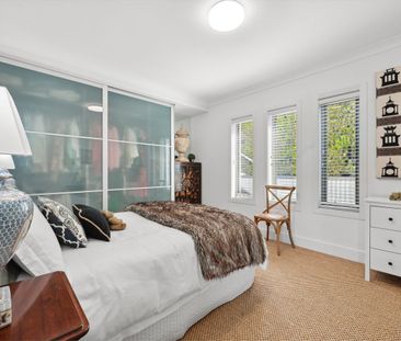 Discover coastal living at its finest in this elegantly designed residence with breathtaking sea and island views. - Photo 6