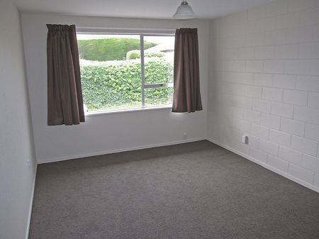 Cute Two Bedroom Unit in a Fantastic Location! - Photo 2
