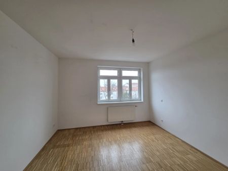 Coole Dachgeschosswohnung mit Dachterrasse (+ zusätzlicher Nutzung des großen begehbaren Flachdaches) - Photo 3