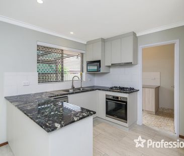 Beautifully Renovated 2-Bedroom Home - Photo 4