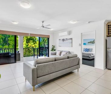 FURNISHED RESORT STYLE APARTMENT, A STONES THROW AWAY FROM THE BEACH! - Photo 2